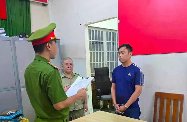 Đỗ Thành Nhung tại cơ quan Công an. xuat-khau-lao-dong-1042-6232.jpg