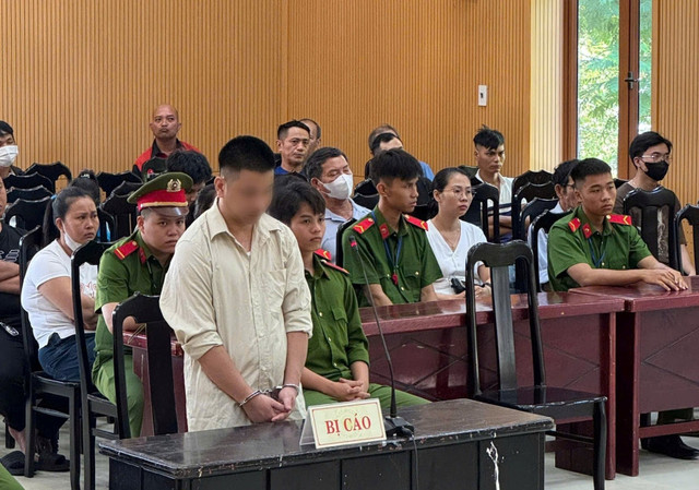 Phan Minh Trung tại phiên toà. 7-6-tatp-matuy10.jpg