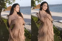 Doãn Hải My đẹp dịu dàng, e ấp khoe vai trần bên bờ biển