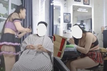 Xôn xao nhân viên nữ một tiệm cắt tóc ăn mặc táo bạo trong khi phục vụ khách