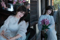 'Bông hồng lai' Ebra Lê diện áo dài duyên dáng, hòa vào không khí Tết Việt