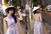 Hot girl xứ Hàn thích thú đội nón lá dạo đường phố khi du lịch Việt Nam