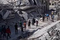 Hình ảnh người dân Palestine trở về khu phố đổ nát ở Gaza