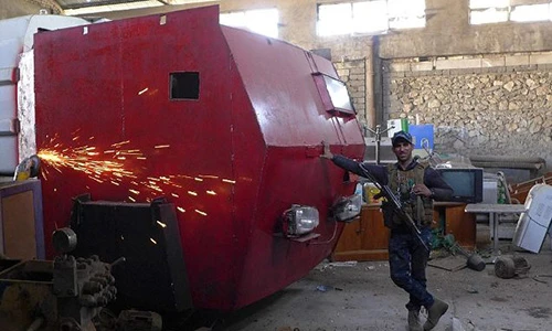 Cảnh tượng gây choáng trong xưởng xe bom của IS