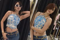 Chị gái Thiều Bảo Trâm dùng khăn làm áo, khoe dáng gợi cảm