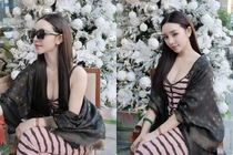 Quỳnh Kool khoe thần thái gợi cảm với outfit hồng khoét ngực sâu