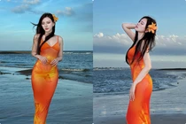 Thu Thủy diện váy cam rực rỡ, khoe vóc dáng nuột nà bên biển