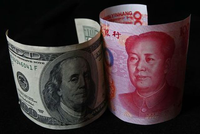 Đồng nhân dân tệ của Trung Quốc chính thức bị phá giá 0,6% Dong nhan dan te cua Trung Quoc chinh thuc bi pha gia 0,6%