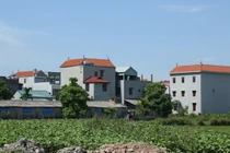 Biệt thự san sát nhau ở ngôi làng phất lên từ việc buôn thịt lợn