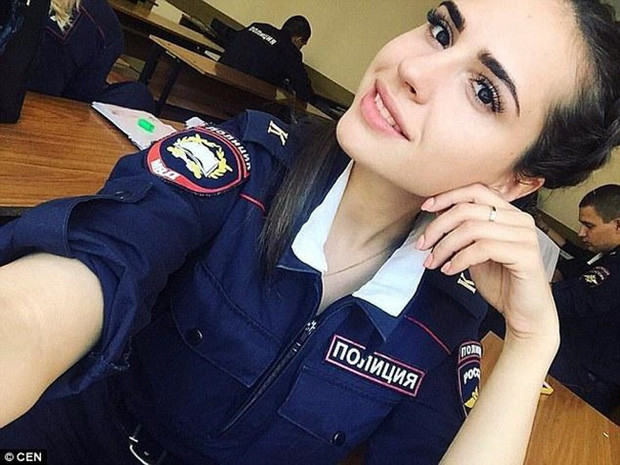 Nữ cảnh sát Inna Nechaeva đến từ Moscow gây ấn tượng với vẻ đẹp sắc sảo. Ảnh: Sputnik, IT.