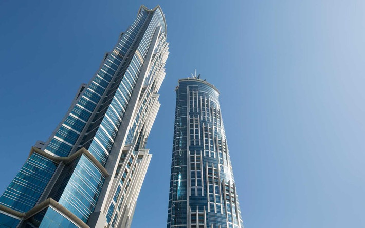 Nếu muốn qua đêm tại khách sạn cao nhất hành tinh, hãy tới JW Marriott Marquis ở Dubai. Công trình có 76 tầng với độ cao hơn 355 m, nắm giữ một kỷ lục trong cuốn Kỷ lục Guinness Thế giới. Ảnh: Getty Images.