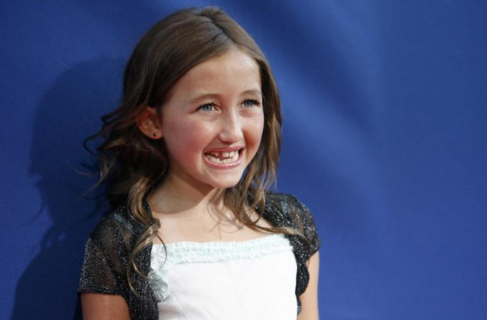 Noah Cyrus là em gái Miley Cyrus. Ngay từ bé, cô bé đã quen với cuộc sống ở Hollywood, được bố mẹ và chị dẫn tới dự các sự kiện cùng. (Ảnh: International Business Times)