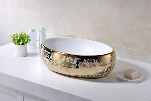 Mẫu bồn rửa mặt lấy cảm hứng từ chiếc bát vàng này quả là sự lựa chọn hoàn hảo để tạo ra không gian sang trọng, tinh tế cho phòng tắm.