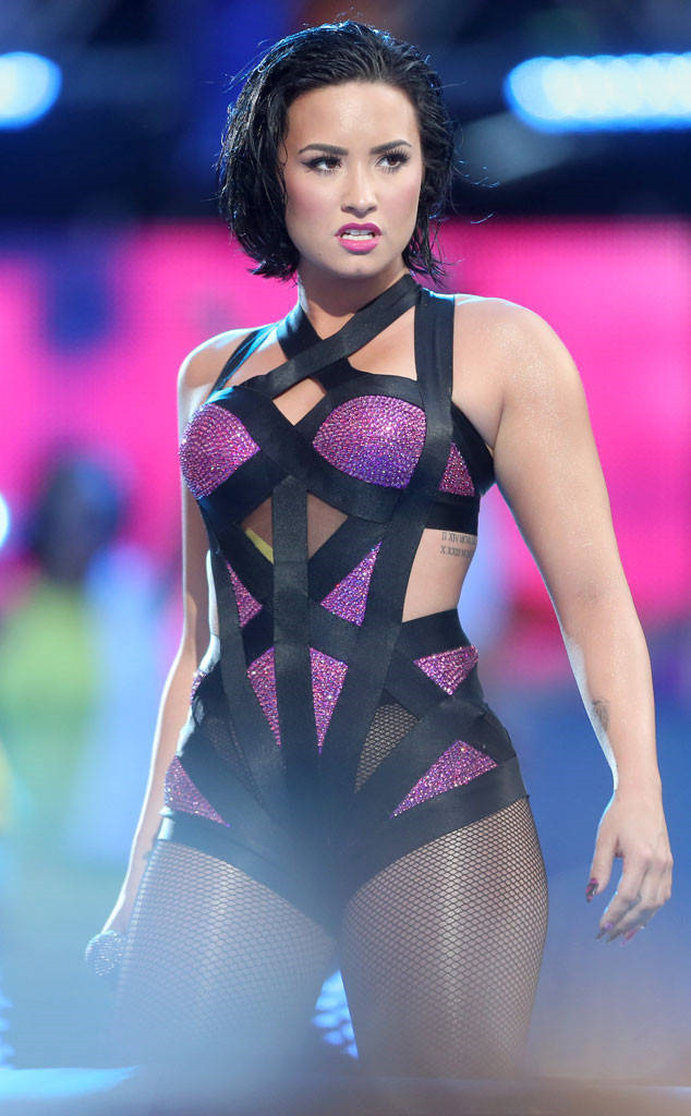 Sau X-Factor, Lovato có chuyến lưu diễn lớn đầu tiên trong sự nghiệp với Neon Lights Tour vào tháng 2/2014. Đến tháng 7/2015, cô tung ra hình tượng trưởng thành và gợi cảm hơn trước đây với đĩa đơn mùa hè Cool for the Summer. Cô giải thích: "Âm nhạc của bạn phản ánh cuộc đời của bạn. Hiện nay tôi đã lớn hơn xưa nhiều và tất nhiên tôi không thể hát như hồi mình 16, 17 tuổi".