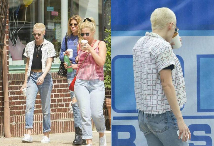 Mái tóc vừa cắt trụi cộng thêm trang phục kiểu tomboy khiến Kristen Stewart càng nam tính hơn.