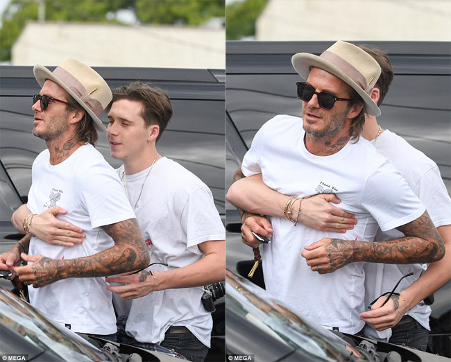 Cũng giống vợ, Beckham cũng vui vẻ hơn rất nhiều so với thái độ ủ dột vài hôm trước khi dẫn vợ con đi chơi. (Ảnh: Mega)