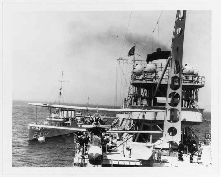Đến ngày 26/7/1945, tàu cập cảng đảo Guam để tiếp nhiên liệu, nhu yếu phẩm. Hai ngày sau, tàu rời đảo Guam hướng đến vịnh Leyte để cùng hội quân với lực lượng đặc nhiệm 95 do phó đô đốc Jesse B. Oldendorf chỉ huy để tiến về đảo Tinian.