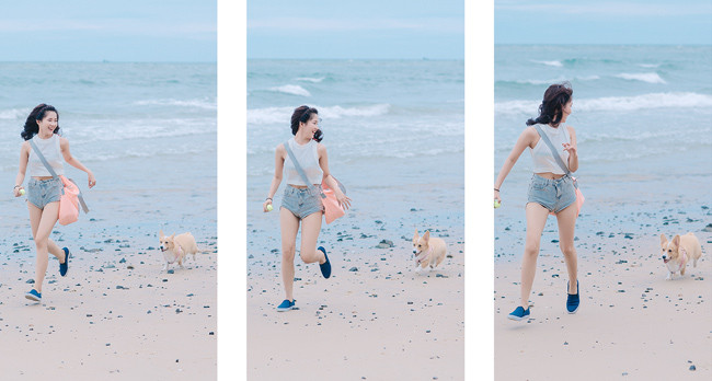 Cô chủ nhỏ và người bạn của mình vui đùa bên bãi biển.