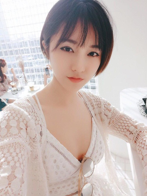 Trương Mễ Tư.