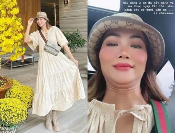 Mùng 2 Tết, H'Hen Niê tiết lộ mình có cằm nọng: "Mới mùng 2 em đã hết mình vì ẩm thực ngày Tết thì đòn bánh Tét có dưới cằm em". H’Hen Niê cũng diện váy xoè rộng rãi, thoải mái để thoả thích ăn Tết.