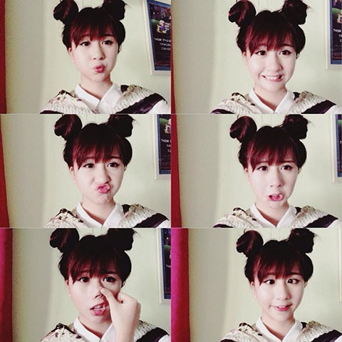 Các hot girl Việt hào hứng chia sẻ kiểu tóc ngộ nghĩnh này gắn liền với tuổi thơ của họ. Quỳnh Anh Shyn "hồi teen" với tóc Na Tra và áo sơ mi trắng.