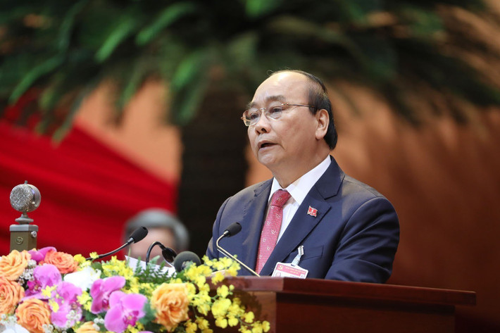 Ủy viên Bộ Chính trị, Thủ tướng Chính phủ Nguyễn Xuân Phúc thay mặt Đoàn Chủ tịch đọc Diễn văn khai mạc Đại hội. Ảnh: TTXVN