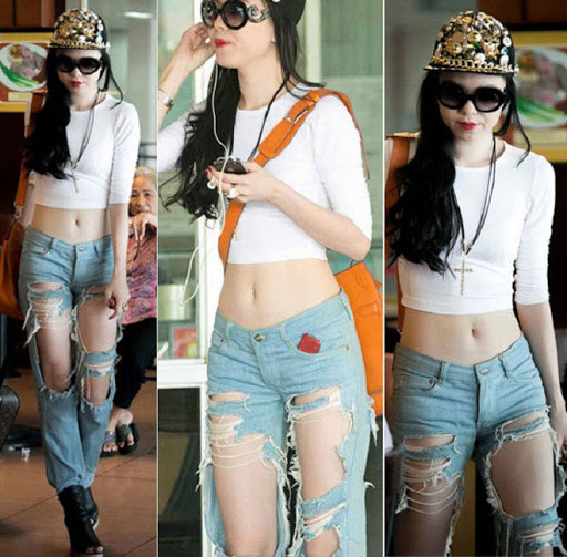 Vũ Hoàng Điệp cũng khiến người đối diện “nhức mắt” khi chọn quần jeans rách te tua để phối cùng áo hở heo.