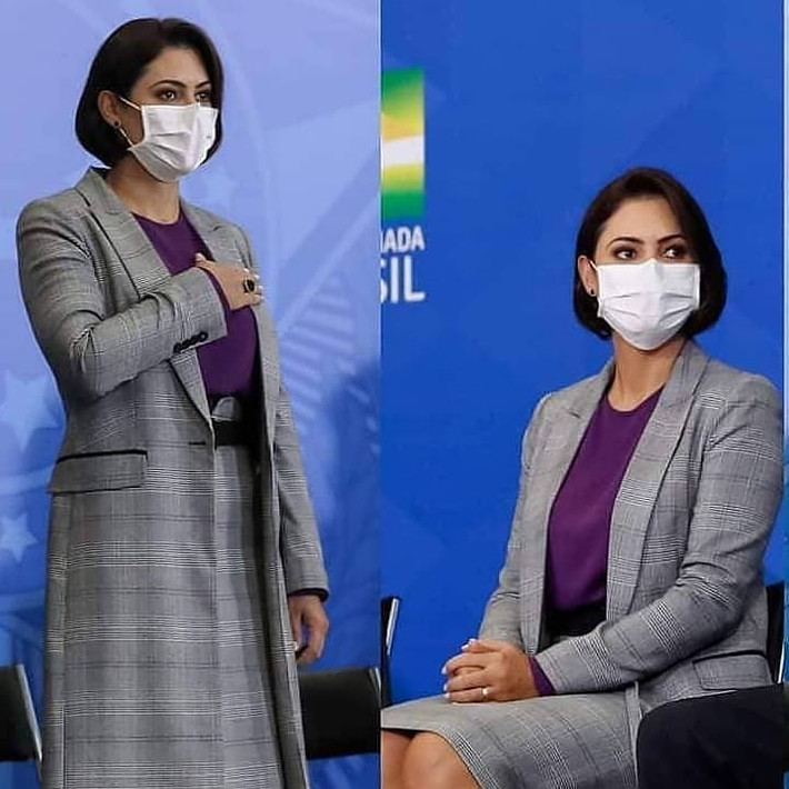 Phu nhân Tổng thống Brazil cũng không quên "bắt" trend màu tím của năm với chiếc áo tím phối cùng chân váy váo áo khoác dáng dài.