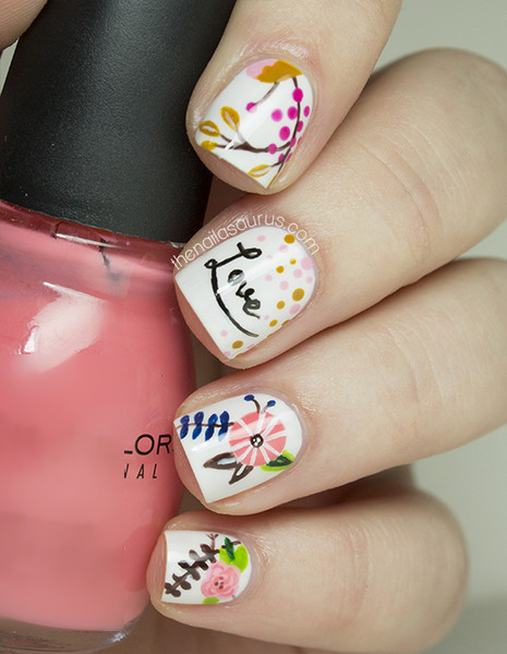 Nail hình hoa lá dễ thương khiến bạn nữ tính hơn.
