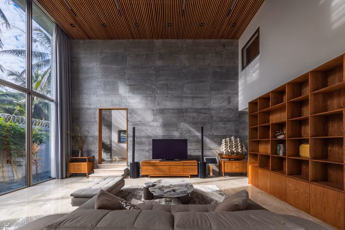 Bề mặt bê tông được xử lý cẩn thận để duy trì kết cấu nguyên bản. Ánh sáng mặt trời lướt nhẹ trên bê tông, tạo họa tiết chuyển động. Ảnh: Oki Hiroyuki