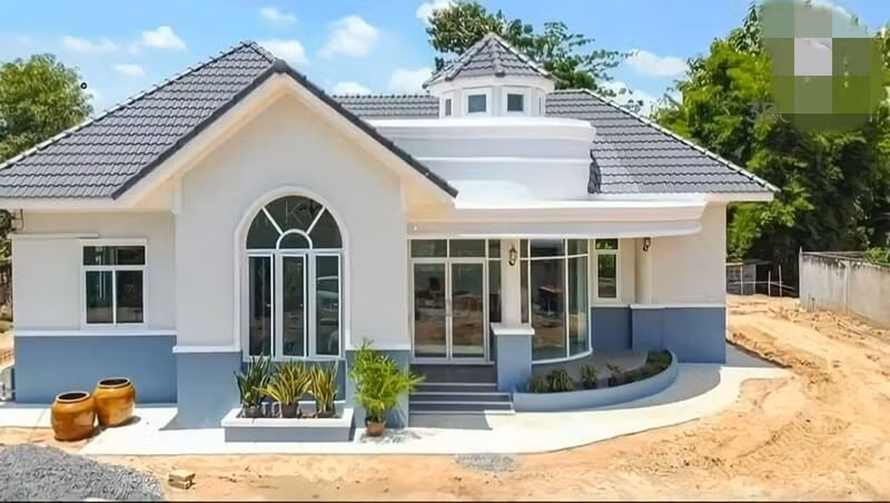 Nhà cấp 4 có gác lửng 3 phòng ngủ phù hợp với gia đình đông người. Thiết kế tận dụng không gian cao hơn và tạo ra không gian sống đa chức năng, tiện nghi. Ảnh: 3bdesign