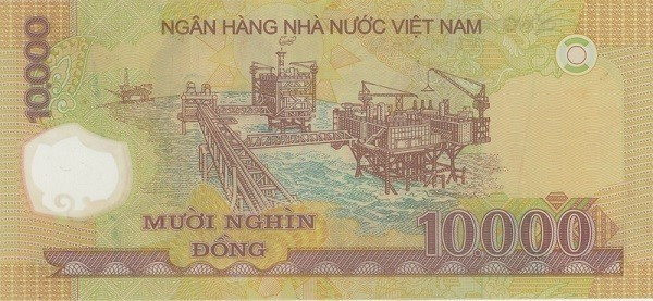 Mặt sau của tờ 10.000 đồng polymer (phát hành năm 2006) là cảnh khai thác dầu khí. Ảnh: Internet
