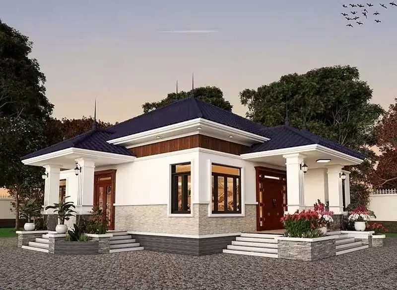 Nhà mái Nhật 1 tầng hiện đại sở hữu kiến trúc tối giản, hình khối vuông vắn. Việc sử dụng vật liệu hiện đại như kính lớn, cửa nhôm cao cấp giúp tận dụng ánh sáng tự nhiên. Ảnh: Internet