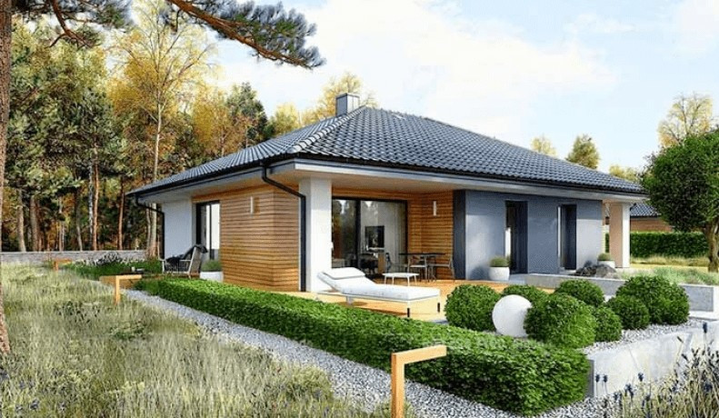 Nhà cấp 4 sân vườn trang trí bằng hệ mái thái ngói xám giật cấp chữ A nhẹ, gam màu mang dư vị hoài cổ. Ảnh: 3bdesign