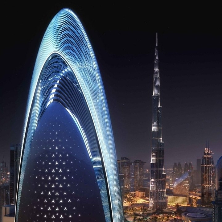 Nằm gần Burj Khalifa ở Dubai, dự án siêu cao tầng này là bất động sản nhà ở gắn thương hiệu Mercedes-Benz đầu tiên trên thế giới. Tòa nhà cao 341 mét, với mặt đứng in họa tiết ngôi sao ba cánh đặc trưng của hãng xe Đức trên hình khối uốn lượn. Ảnh: Dezeen