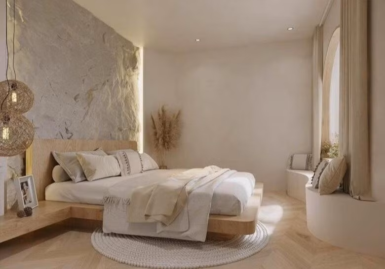 Phòng ngủ của Huyền Lizzie ấn tượng với mảng tường đá đầy nổi bật. Ảnh: FBNV