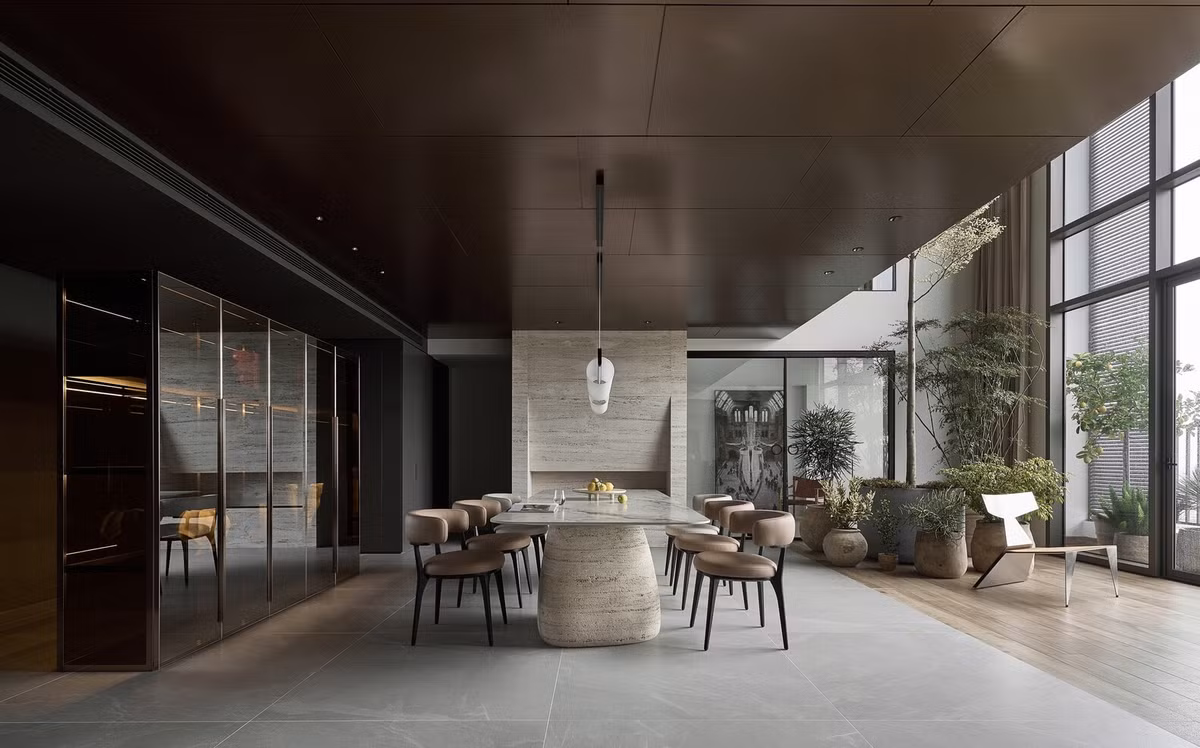 Hai khoảng thông tầng lớn được khai thác với hai chức năng khác nhau: một cho phòng khách rộng, và một cho khu vườn trong nhà kết nối với bếp, phòng ăn và phòng ngủ. Ảnh: Wuyhoang Studio