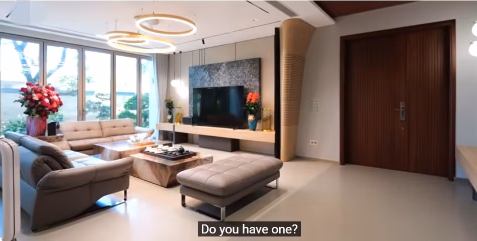 Phòng khách mang thiết kế hiện đại, đơn giản. Ảnh chụp màn hình NhaF