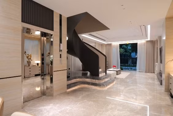 Cầu thang xoắn là điểm nhấn trong căn nhà. Ảnh chụp màn hình NhaF