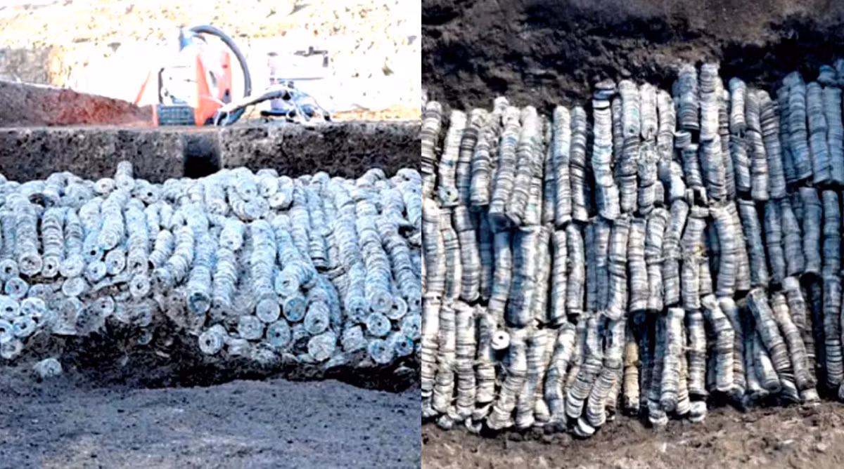 Mỗi bó như vậy chứa khoảng 100 đồng xu, chúng được buộc chặt với nhau bằng dây rơm. Ảnh: @Thành phố Maebashi.