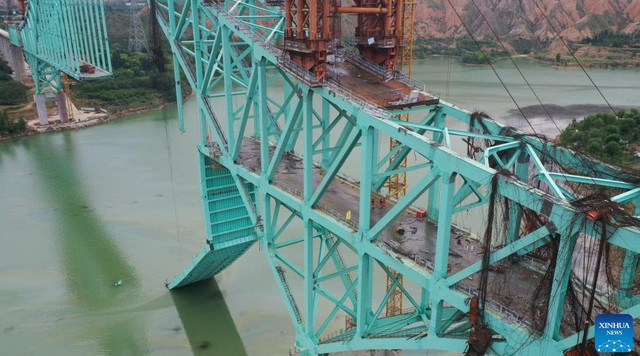 Ảnh: Tân Hoa Xã. cau1.png
