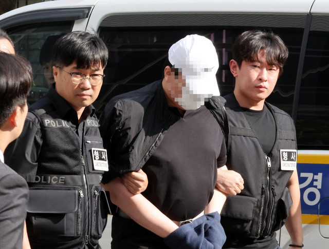 Nghi phạm đã bị cảnh sát bắt giữ. Ảnh: Yonhap. hanquoc.png