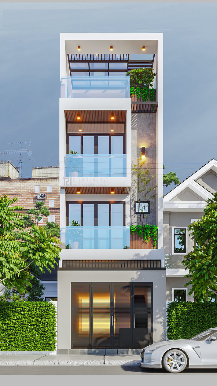 Căn nhà phố 4,7x20m do kiến trúc sư Thuận Đặng và đồng nghiệp thực hiện mang một dáng vẻ hiện đại, đơn giản. Mặt tiền sử dụng lan can kính, cửa nhôm kính tạo sự sang trọng, lấy ánh sáng vào nhà. Anh cho biết, đặc điểm là phố là không có cửa sổ ở hai bên hông nhà do tiếp giáp với nhà hàng xóm. Vì vậy, nhóm đã đưa giải pháp ánh sáng và cây xanh vào trong qua hệ thống cửa kính lớn, giếng trời để tạo cảm giác rộng thoải mái cho từng không gian.