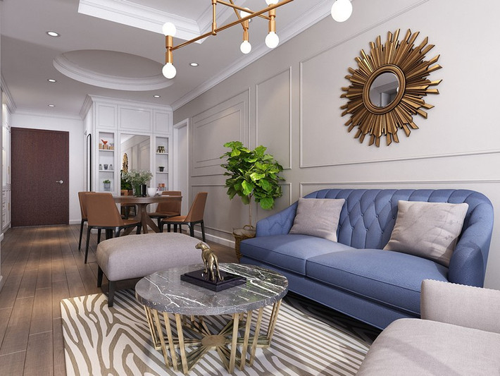 Ghế sofa màu xanh da trời cùng chậu cây trang trí, khiến không gian thềm phần gần gũi, thân thuộc.