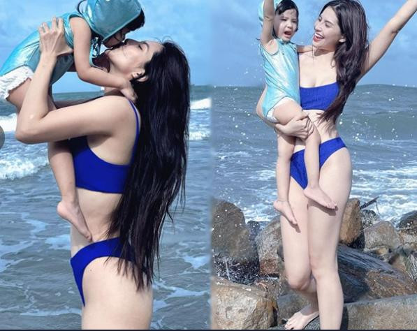 ##b###Thiên An gây chú ý khi đăng tải loạt ảnh diện bikini khoe dáng bên con gái nhận "cơn mưa lời khen". Cô nàng nổi bật với vóc dáng đầy đặn cùng làn da trắng mịn. "Đúng là gái một con trong mòn con mắt là có thật", một bình luận của dân mạng.