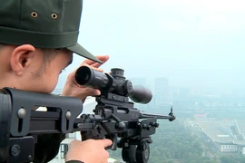 Cảnh sát bắn tỉa chốt trực bảo vệ Đại hội Đảng