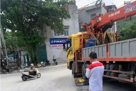 Va chạm xe ô tô cẩu, người phụ nữ đi xe đạp tử vong 