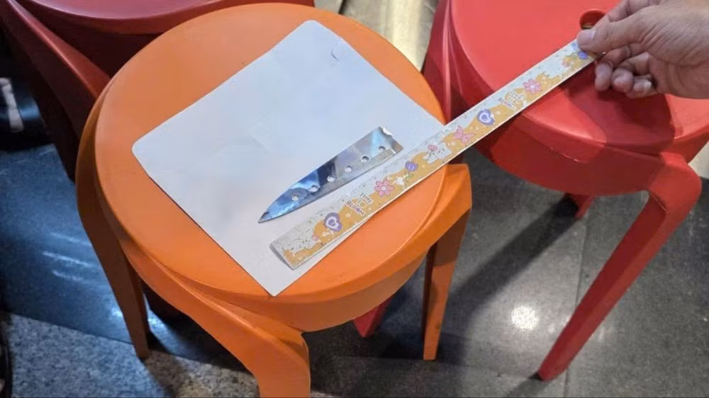 Hung khí gây án bị công an thu giữ. Ảnh: CA