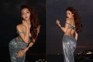 Hot girl Hoàng Yến diện váy cắt xẻ khoe dáng 'đồng hồ cát' trên biển đêm