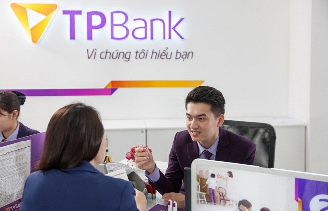 6. TPBank Theo số liệu bình quân ngân hàng cung cấp, thu nhập tháng của mỗi cán bộ, công nhân viên trung bình là 18,56 triệu đồng, tăng gần 3 triệu/tháng so với năm trước đó. Ảnh: ub.com.vn.